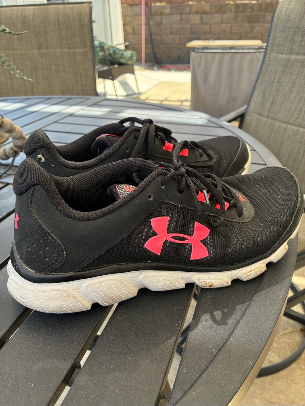 Under Armour Black Sneakers with Pink Logo Accents